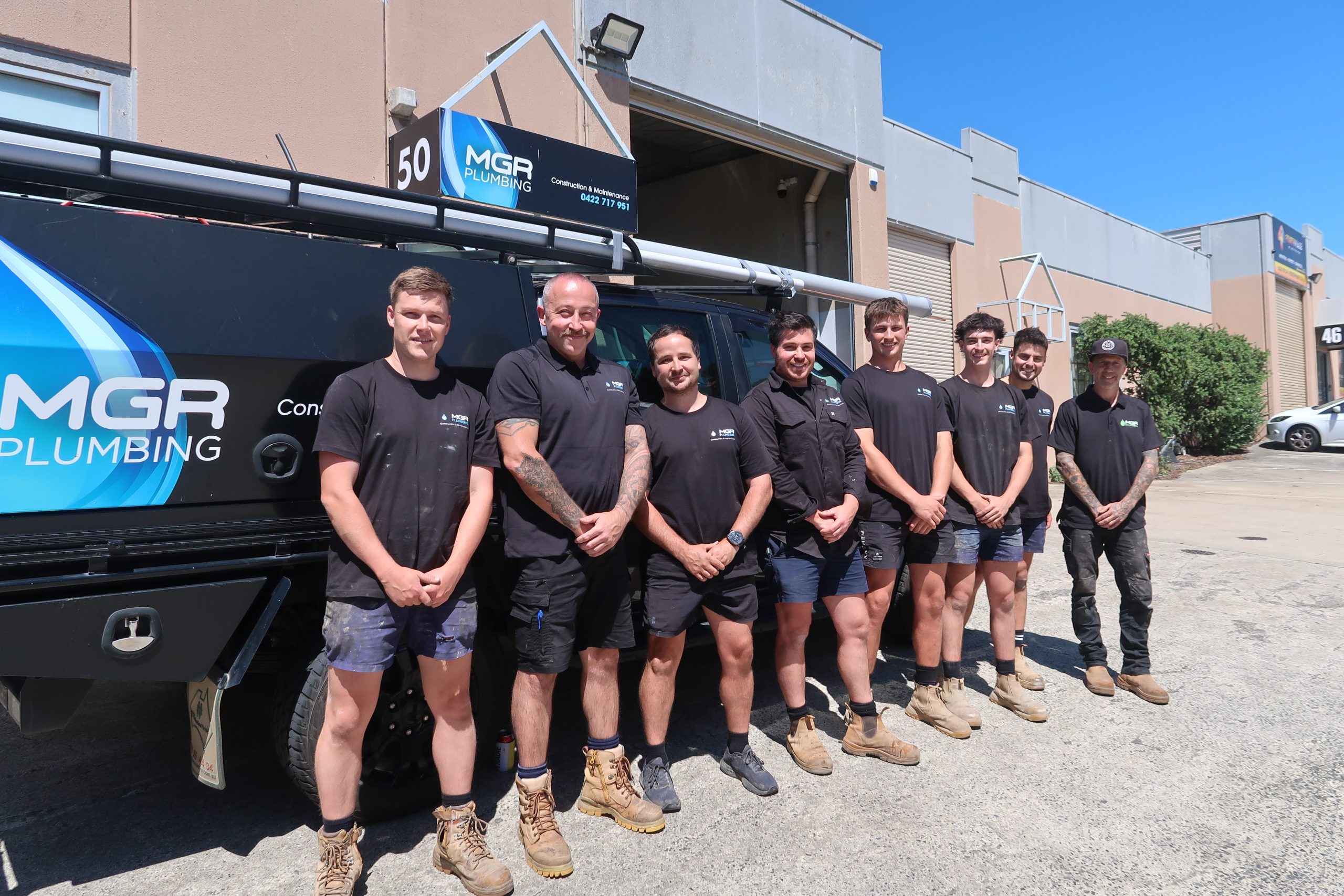 team photo of MGR plumbing